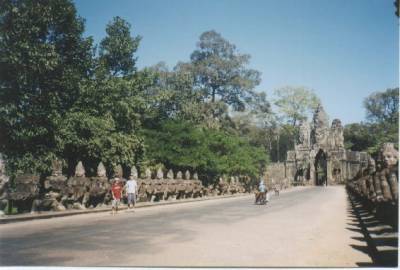 The path of ancient stone soldiers, still guarding the ancient ruins of ANGKOR THOM