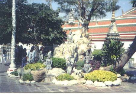Statuary at Wat Pho depicting massage therapists positions