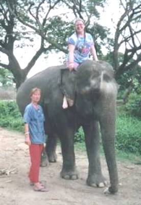 Elephant trainer Margot, with Judith on Ramruay.&nbsp; This photo was taken after we swam in the river together.&nbsp; It was so awesome...