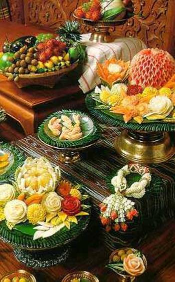 Carved fruits and vegetables become edible art.