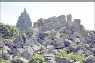 The earthquake struck at 5:54 a.m. near the famed Borobudur temple complex, caving in roofs and sending concrete walls crashing down. Thousands were wounded.