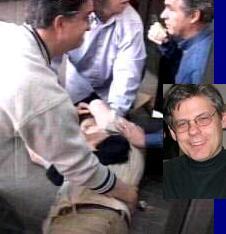 A security camera photo appears to show people tending to John Owens (inset), a former WDIV-4 employee injured at the station in a shooting Friday. (Photo Illustration Courtesy WDIV-NBC Image/Mort Crim Communications)