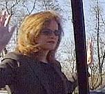 WJLA-7 investigative reporter Andrea McCarren puts her hands up after police surrounded her car while she was working on a story. (Courtesy WJLA via U.S. Newswire)