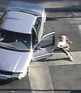 This was the scene on KABC-7 as a man ran from his car after a chase before being fatally wounded by police gunfire on live TV. (Courtesy KABC-TV)