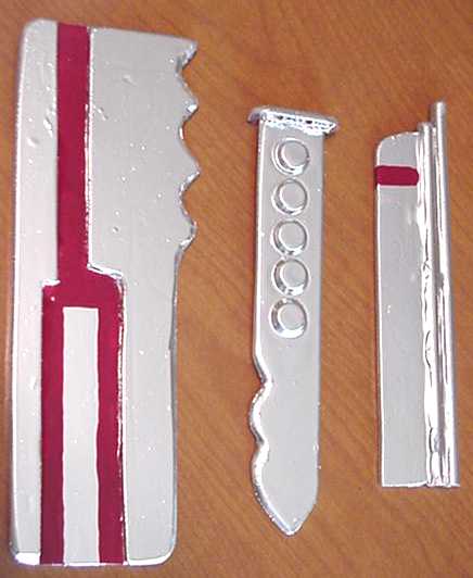 Brian has made a set of Boba Fett shin tools. These stick out of Boba Fett's shin pocket.