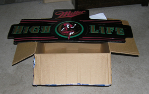 unfolded, on top of the box used for shipping