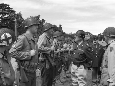 EVEN PATTON LOOKS UP TO THE 1ST DIVISION