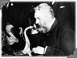 Alexander Graham Bell at the phone