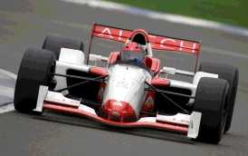 �b�J�A��K��ڥd�S��{���ɯ��a�Ӫ����߫�, Emerson Fittipaldi�b�n�D���������ܪv�j�v�ɤ����o�ȭx; �Ϭ��L�b���ɤ������p�C Picture Source: Supa Net