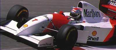 Michael Andretti���ۨ⩡�d�S��{���a�x���W�i�x�@�Ť�{��, ���o�ӨM�w���L�a�ӵh�W���^�СC	Picture Source: Motor Pics