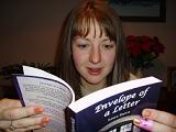 Picture of Laura reading 'Envelope of a Letter'