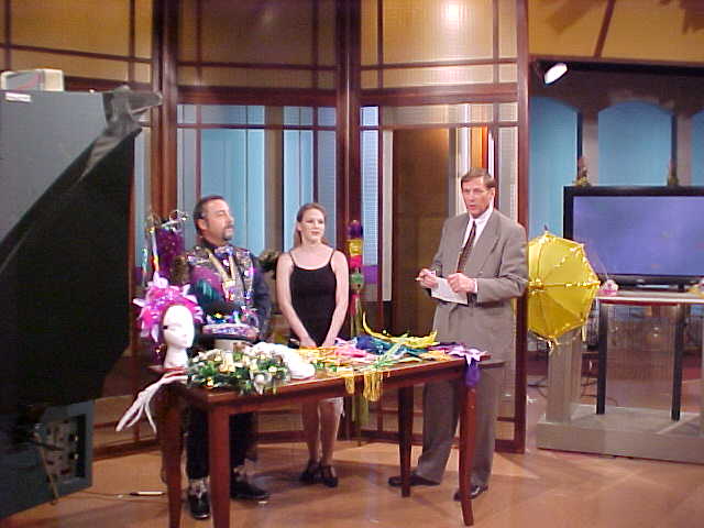 From left:  Edward R. Cox, his assistant Tara Brewer, and WWL Anchorman Eric Paulsen