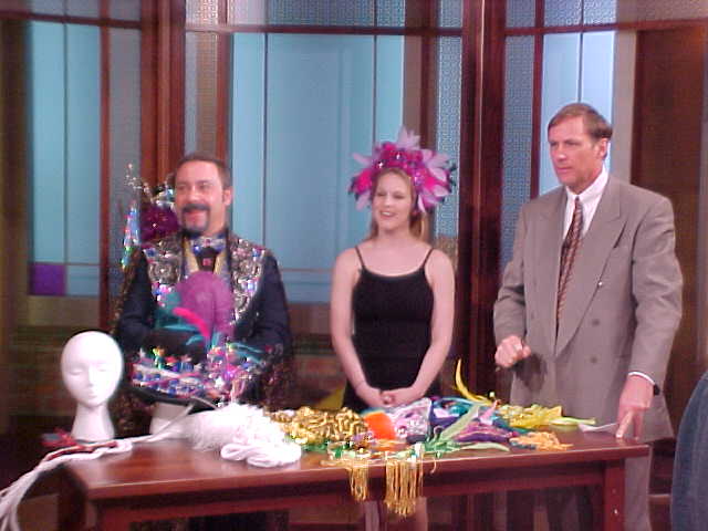 From left:  Edward R. Cox, his assistant Tara Brewer, and WWL Anchorman Eric Paulsen