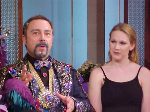 From left:  Edward R. explains his theories while Tara looks on