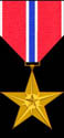The Bronze Star -- 
 Diving on a nade to save the life of at least one other squad member.