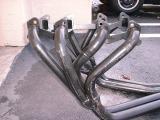 TR8 headers (left side closeup)