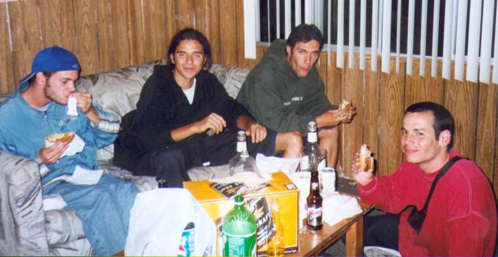 Fred, J.B., Xavier and Eric eating Burgers