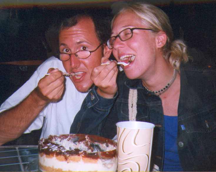 Andi and Tina eating Verena's birthday cake