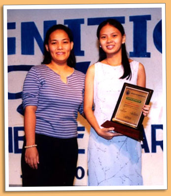 Carla receives a plaque