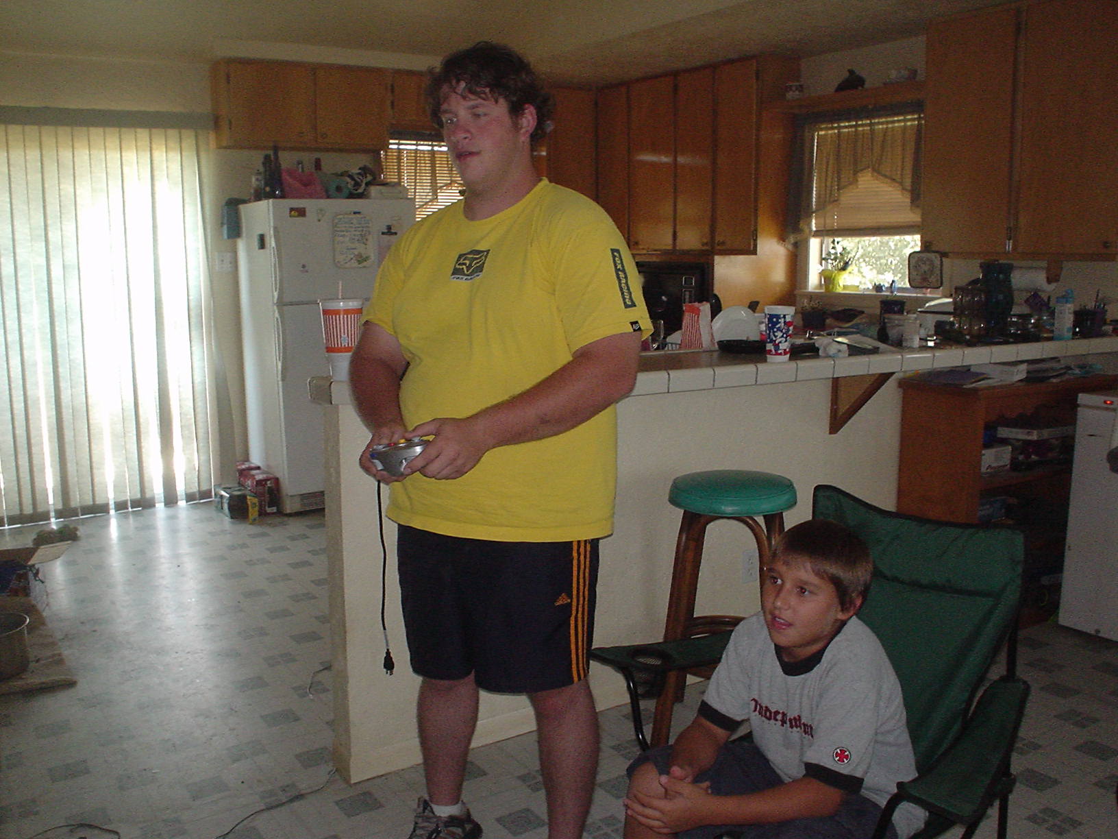 My little brother being brainwashed by the best!&nbsp; ^_^