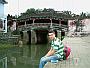 Sat by the Japanese bridge in the lovely little town of Hoi-an
