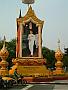 It is the king of Thailand. All over Bangkok you can find these ornate pictures of him.