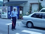 Ah the lenghts this country will go to in order to keep the unemployment figures low. A frugal old guy "controlling" traffic outside my school