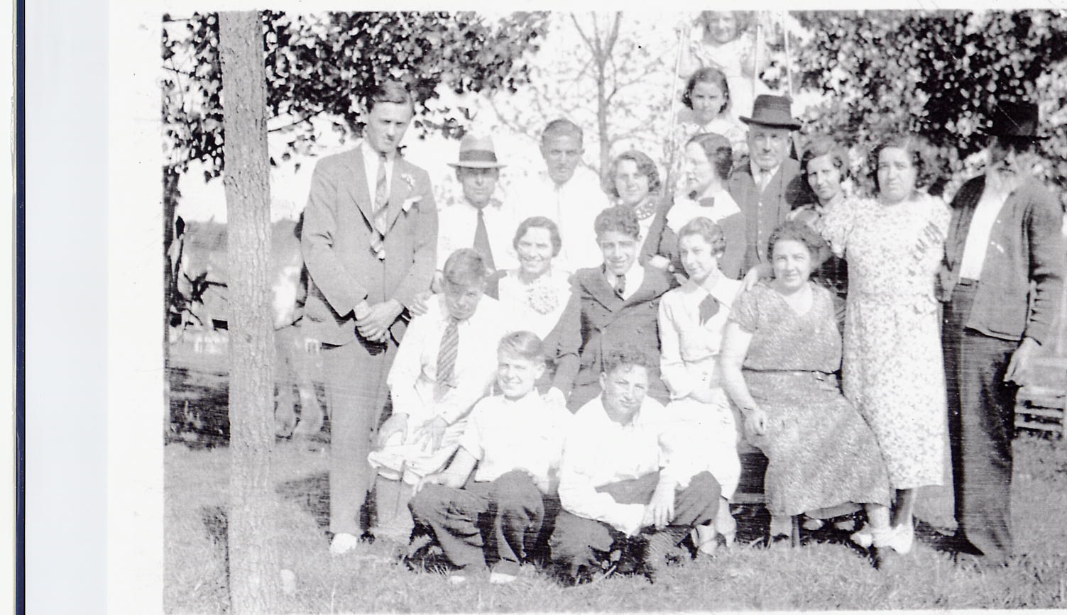 A GELB FAMILY GATHERING, POSSIBLY AT THE GELB BROTHERS� KOSHER HOTEL, THE LAKE VIEW HOUSE, IN ELLENVILLE, NEW YORK. HENRY GELB IS 2ND FROM THE LEFT. HIS UNCLE JOSEPH GELB WORE A HAT, TOWARDS THE MIDDLE OF THE PICTURE. JOSEPH�S DAUGHTER, TILLIE, IS THE LAST ONE SEATED ON THE RIGHT. ELIAS, HENRY�S FATHER, IS ON THE FAR RIGHT. TILLIE�S BROTHER, GUSSIE PRINCE, IS THE 2ND FROM THE RIGHT. TILLIE�S SON, ARTHUR, IS KNEELING IN THE CENTER. PLEASE HELP TO IDENTIFY EVERYONE ELSE IN THIS PICTURE.