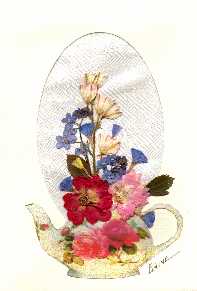 little china teapot holds&nbsp; miniature rose, pink larkspur, blue statice, stem of larkspur, forget me nots and couple of rose leaves