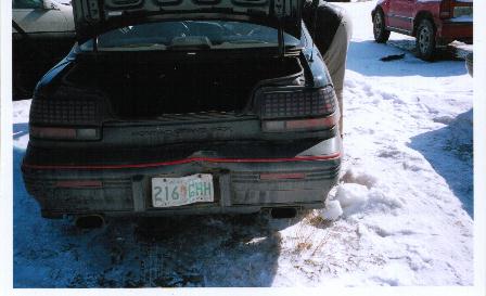 view from rear. the bumper hit a street light pole after I spun after the initial hit.