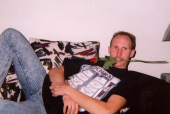Jazzy John with a rose in his mouth.
