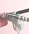 purl through the back loop