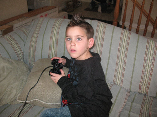 Drake playing his new playstation 2 on Xmas