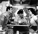 Richard Egan (center) with Gilbert Roland and Jane Russel in Underwater 1955