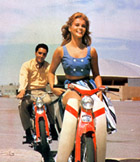 Elvis and Ann Margret ride bikes during their date in Viva Las Vegas
