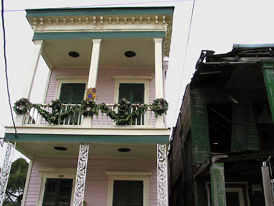 Beautifully restored Lower Garden District home, next to the charred remains of an old home that has yet to be restored.