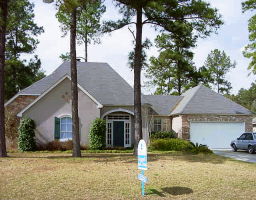 Nice stucco & stone Mandeville home.