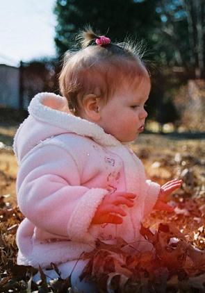 She's considering touching the leaves...&nbsp; 