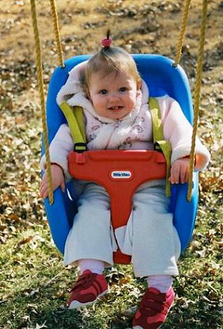 Again, Emma stopped and smiled just for the camera - afterwards we promptly began swinging again since Emma just loves it!