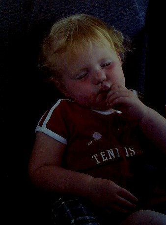 trying to eat and sleep at the same time