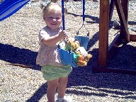 Swinging her baby