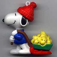 Whitman's, 1997, Snoopy dragging sled with birds