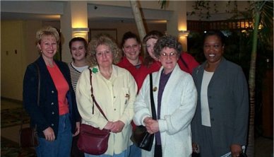 Group photo in hotel lobby