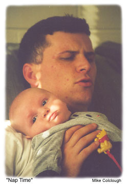 father and son enjoying naptime