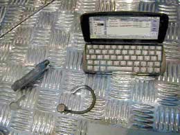 Psion phone and Bluetooth earpiece,wired ancillary control