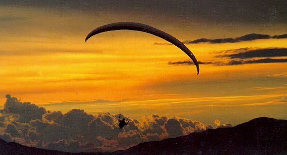 PARAGLIDING AT SUNSET