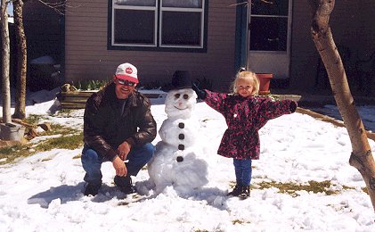 Rick and Katy with snowman