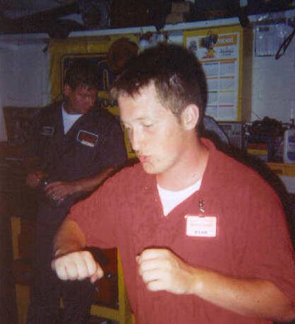 Ryan begging for someone to take his place at the Old Mill. Gregg, our other mechanic, is in the background.