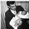 Dad holding me
