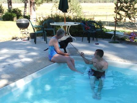 Bryan, Dee and Dixie enjoying the pool in the backyard,!!